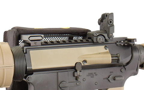Hard Hitting Brass Catcher With Picatinny Mount And Heat Resistant Mesh For Rifles attached to rifle side view