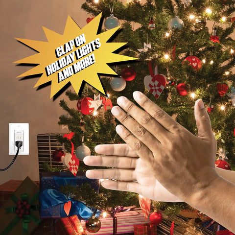 Hands clapping near a Christmas tree with Clap Control Dual Outlet Wall Plug With Noise Sensor for lighting control.