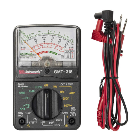GMT 318 Analog Multimeter With Six Functions And Fourteen Ranges Reads AC And DC Volts Up To 500V next to red test leads