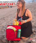 Woman using Ultra Compact Cooler Smart Cart Red Insulated Collapsible Rolling Tote For Tailgate BBQ Beach And Summer Trips Lightweight