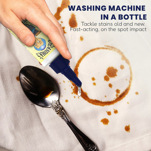 Secret Spot Remover For Clothes Chlorine Free Toxin Free Stain Remover For Fabric That Eliminates Oil Paint Blood And Pet Stains Without Damaging Color Safe On Most Fabrics Gentle Non Bleach Formula 2 Ounce Bottle being applied on stained fabric next to a spoon.