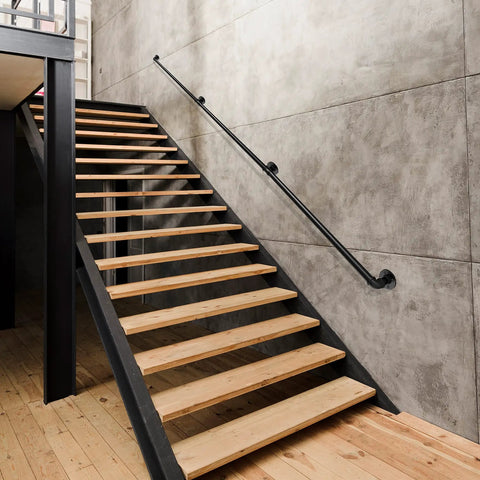 Badass 12 Foot Matte Black Stair Handrail Wall Mount Pipe Style Metal Grab Bar Non Slip Grip Built Tough For Indoor Steps And Outdoor Decks, mounted on wooden staircase.