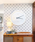 Starburst Geometric Wall Stencil Kit 2 Pack Of 16.5 X 31.5 Inch Stencils for large starburst pattern on living room wall with clock.