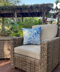 Outdoor chair with blue floral pillow; Set Of 2 Waterproof Outdoor Throw Pillows With Inserts, 18x18 Inch Square Cushions For Patio Furniture.