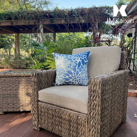 Outdoor chair with blue floral pillow; Set Of 2 Waterproof Outdoor Throw Pillows With Inserts, 18x18 Inch Square Cushions For Patio Furniture.