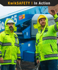 Two workers wearing Torrent Class 3 Safety Rain Jacket ANSI Tested OSHA HiVis Reflective Coat Waterproof Weatherproof Rain Gear Hideaway Hood