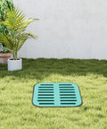 Heavy Duty Outdoor Drainage Catch Basin With Grate Kit For Yards And Lawns 15.7 Inch Square on grass surface