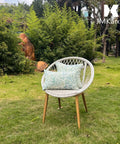 Pack Of 2 12x20 Patio Lumbar Pillows Waterproof Outdoor Cushions on white chair in garden