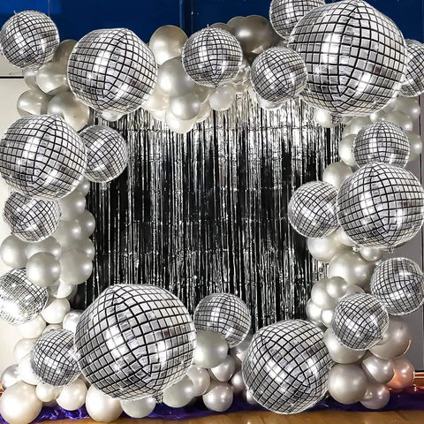 Metallic Silver Disco Balloons In Mixed Sizes 32-Inch, 22-Inch, And 10-Inch - 20 Count 4D Mylar Balloons For 70s 80s Disco Theme Parties, Birthday Or New Year Decor, Shiny Reflective Party Supplies arranged against tinsel backdrop.