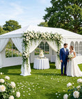 Outdoor White Waterproof Gazebo Tent With Removable Sidewalls And Windows Ten By Twenty Feet Heavy Duty Event Shelter at a wedding