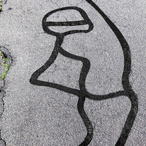 2 Inch Self Adhesive Asphalt Crack Filler Tape for Driveways and Parking Lots applied on asphalt surface