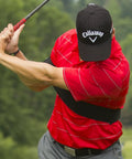 Golfer demonstrating Groove Your Golf Swing Path With This Easy Full Swing Trainer For Wedges And Short Irons, Improves Form.