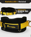 KwikSafety black and yellow beaver tail safety belt with adjustable straps and metal rings.