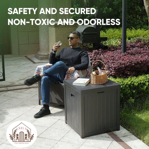 Man sitting next to Rugged Outdoor Deck Box 51 Gallon Storage Chest For Patio And Porch, Weatherproof Grey Plastic Resin Bin With Lid
