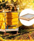 3 Pack 10 Frame Beehive Metal Screened Bottom Boards With Entrance Reducers displayed with beehive in sunny garden.