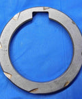 Top Shelf Bulk Lot Of Eight Precision Milling Machine Arbor Spacers For Your Shop Rig One Inch To One Nine Sixteenths Inside Diameter tool, heavy-duty steel spacer viewing top-down on blue background.