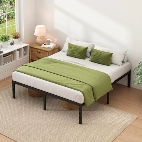 Bedroom with King Size Metal Bed Frame With Built In Storage Space Heavy Duty Sturdy Mattress Foundation Easy Assembly No Box Spring Needed Black 14 Inch Clearance, green bedding, and two pillows.