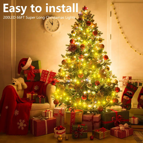 Warm White 200 LED Christmas Lights 66ft Outdoor Indoor String Light with Remote Control 8 Modes Memory Timer Plug In Green Wire for Tree Yard Party Xmas Decor. Image of a decorated Christmas tree with glowing warm white LED lights, surrounded by wrapped gifts indoors.