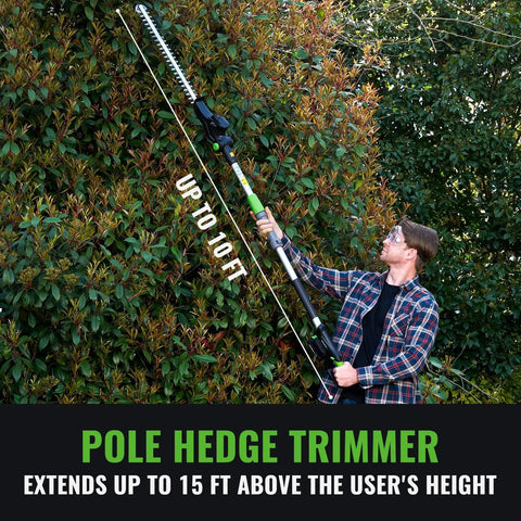 Cordless 20V Pole Hedge Trimmer With 20 Inch Cutting Length 15 Foot Reach in use by person trimming tall hedge