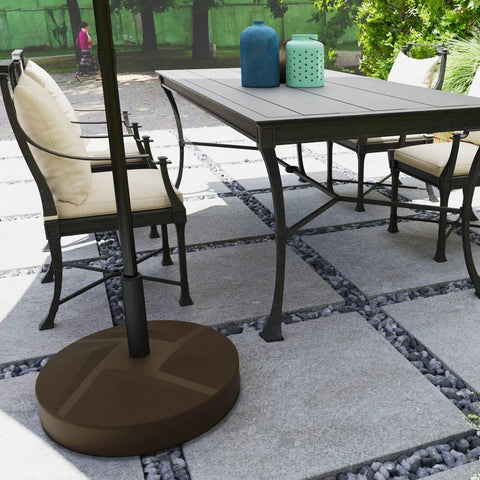 Heavy Duty Patio Umbrella Base Holder Built To Last For Outdoor Use Fillable Up To 66lbs With Stand Or 55lbs With Water Universal Pole Fit 1.4 1.5 Or 1.9 Inch Holds Umbrellas Up To 9.8 Feet Two Adjustable Knobs Brown supporting table umbrella on patio