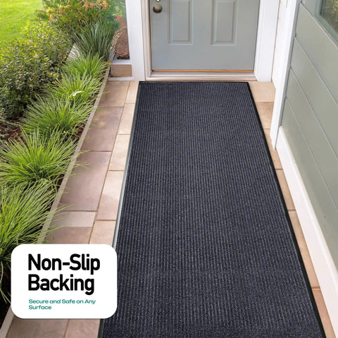 Extra Large Heavy Duty Commercial Entrance Rug Top Notch Walk Off Mat Built Tough For Heavy Foot Traffic Water Resistant Boot Scraper Gray Floor Mat at an entryway.