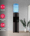 Top Loading Water Cooler Dispenser With Hot And Cold Water And Child Safety Lock Freestanding Slim Space Saving Design For Home Or Office No Fuss 3 Or 5 Gallon Bottles Black in room setting