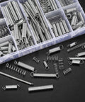 Front view: 210-piece zinc-plated steel spring kit with compression and extension springs in a clear organizer