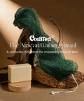 African Net Sponge Exfoliating Bath Loofah for Deep Cleansing Body Scrubber with soap bar on natural background.