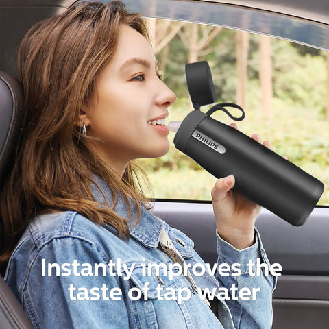 Woman drinking from Stainless Steel Water Bottle With Filter That Delivers Fresher Tasting Water On The Go GoZero Everyday BPA Free