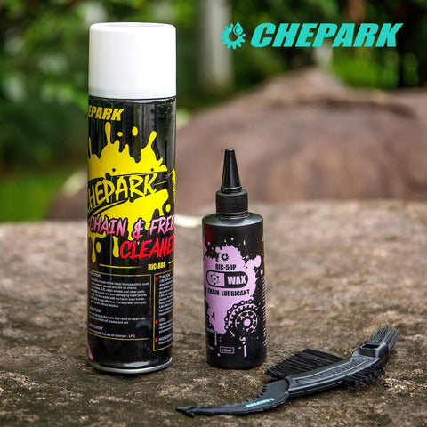 Drivetrain Cleaning And Lubrication Essentials Kit With Bicycle Degreaser And Lubricant Brush Tool displayed on outdoor surface