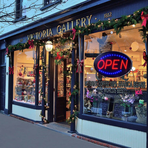 Storefront with holiday decorations and bright LED open sign for business 19 by 10 inch large eye catching electric display board