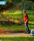 Man using 1.5 Gallon 2.0 Peak HP All Around EZ Wet Dry Vacuum 3 In 1 Portable Compact Shop Vacuum for blowing leaves outdoors