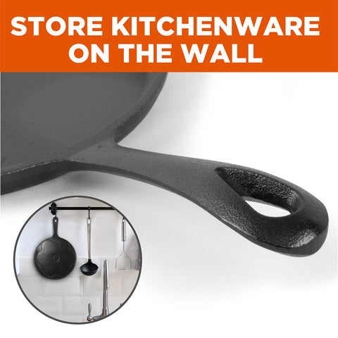Close-up of cast iron griddle handle for Three Piece Cast Iron Griddle Set Pre Seasoned For Easy Cooking Includes 8 Inch 10 Inch And 12 Inch Griddles Works On All Cooktops Including Induction Ideal For Stovetop Oven Campfire And Outdoor Barbecues Cook Up A Storm, shown hanging in kitchen.