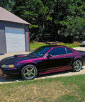 Dead Straight Automotive Colorshift Basecoat Midcoat One Gallon Ready To Roll With Slow Reducer Mix on a purple-black sports car exterior.