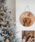Six Round Sublimation Door Hanger Blanks For DIY Wall Decor with dog image and 'Merry Christmas' text on wall near Christmas tree