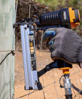 Using a pneumatic 18 gauge fencing stapler with belt hook, seven eighths inch staples, collated for mesh and trellis fencing on a post