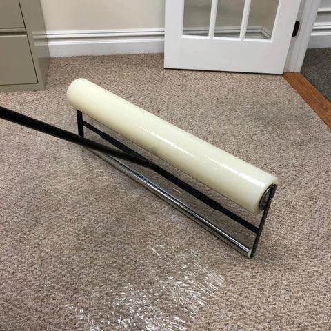 Carpet Protection Film 24 Inch By 50 Foot Self Adhesive Floor Shield Rug Guard roll on carpet, showing easy peel install