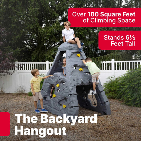 Kids playing on Skyward Summit Climbing Wall Playset For Kids Ages Four To Eight, 6.5 Ft Four Sided Rock Wall, Backyard Outdoor Playground