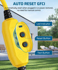 Close-up of 3 Ft Automatic GFCI Outdoor Extension Cord 12 Gauge 3 Conductor Heavy Duty Power Cable with LED light in garden.