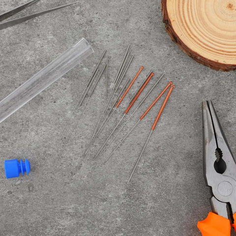 Stainless Steel Nozzle Cleaning Needles Set, 10-Piece Clear Bottle, Includes 0.15mm To 1.0mm Tips For 3D Printers, tools on table