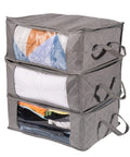 Three gray foldable large clothes storage bags with clear windows and carrying handles, ideal for dorms and bedrooms.