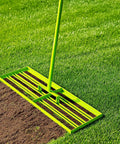 Pro Grade Stainless Steel Lawn Leveling Rake With Adjustable 30 To 74 Inch Handle Anti Flipping Design on green lawn