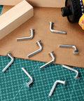 Heavy Duty Pallet Rack Safety Pins J Bolt Drop Pin Set Rust Proof Iron M5 for Warehouse Shelving Units on table