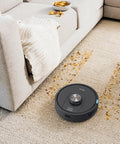Robot Vacuum With Matrix Clean And Precision Mapping Self Empty Base With 30 Day Capacity Bagless Powerful Pet Hair Cleaning WiFi Enabled Black Renewed on carpet near sofa