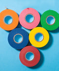 Colored Masking Tape Set 0.6 Inch By 15 Yards 6 Pack In Vibrant Yellow Green Blue Orange Pink Red displayed on blue background