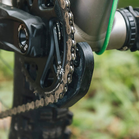 Close-up of Zippa Lite MTB Bash Guard for ISCG05 Mount Fits 26T To 32T Chainrings Bicycle Chain Guard on a mountain bike.