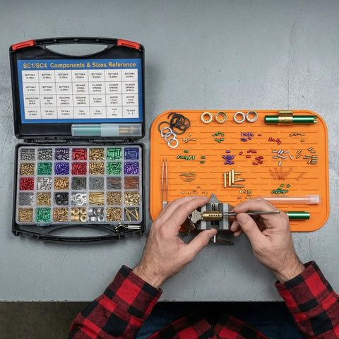Lock Rekeying Kit With Cylinder Pinning Set showing components for DIY home security maintenance, including pins and springs.