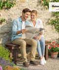 Couple sitting on 35.4 Inch Wooden Garden Bench With Storage Shelf For Patio And Balcony Two Seater Outdoor Bench In Carbonized Wood