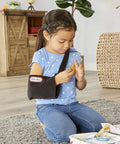Child using Realistic Kids First Aid Kit For Pretend Doctor Play With 25 Accessories Including Gauze Pads And Bandages, Interactive Medical Toy Set For Ages 3 And Up, Perfect For Imaginative Role Play And Kiddo Fun