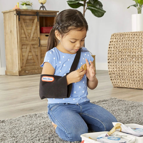 Child using Realistic Kids First Aid Kit For Pretend Doctor Play With 25 Accessories Including Gauze Pads And Bandages, Interactive Medical Toy Set For Ages 3 And Up, Perfect For Imaginative Role Play And Kiddo Fun